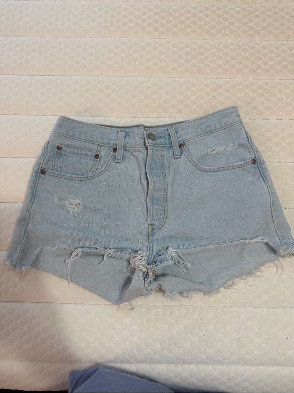 Levi’s 501 Original Light Blue Distressed High-Rise Denim Shorts